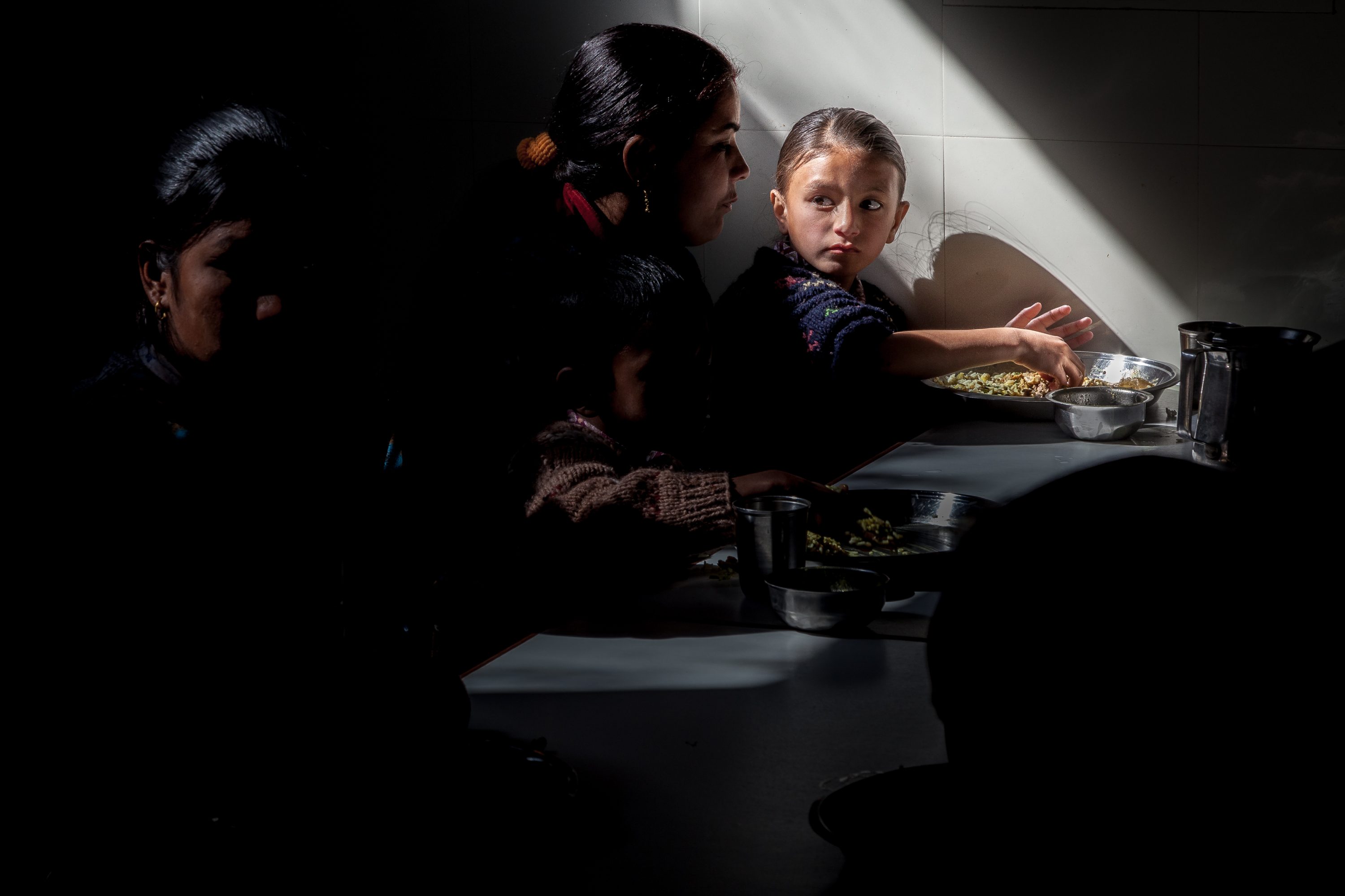AGRICULTURE AND FOOD PORTFOLIO A group of mothers and children have lunch in Nepal
