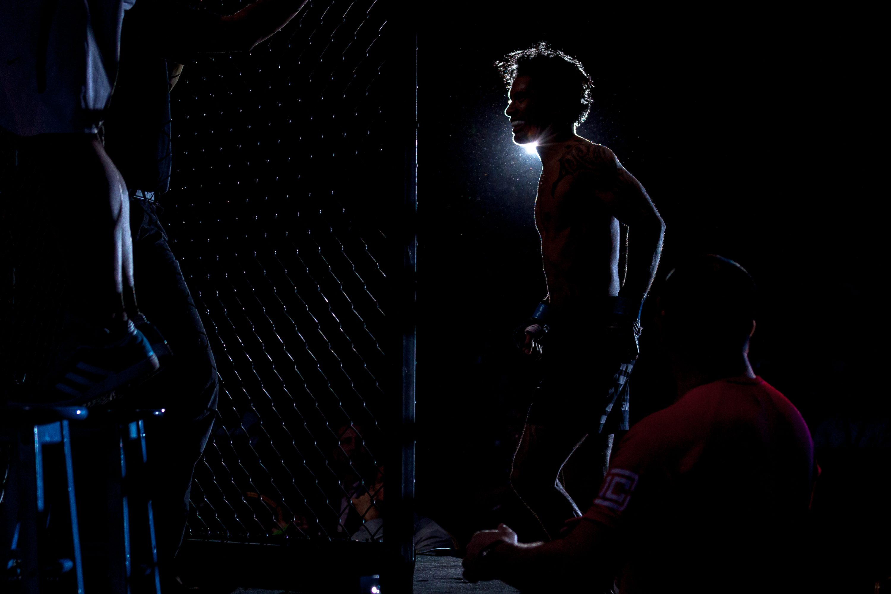 Vincent Latoel enters the cage before his fights in Cambodia