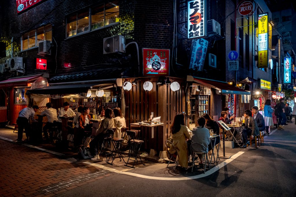 Residents dine and drink at a traditional tavern in Tokyo
