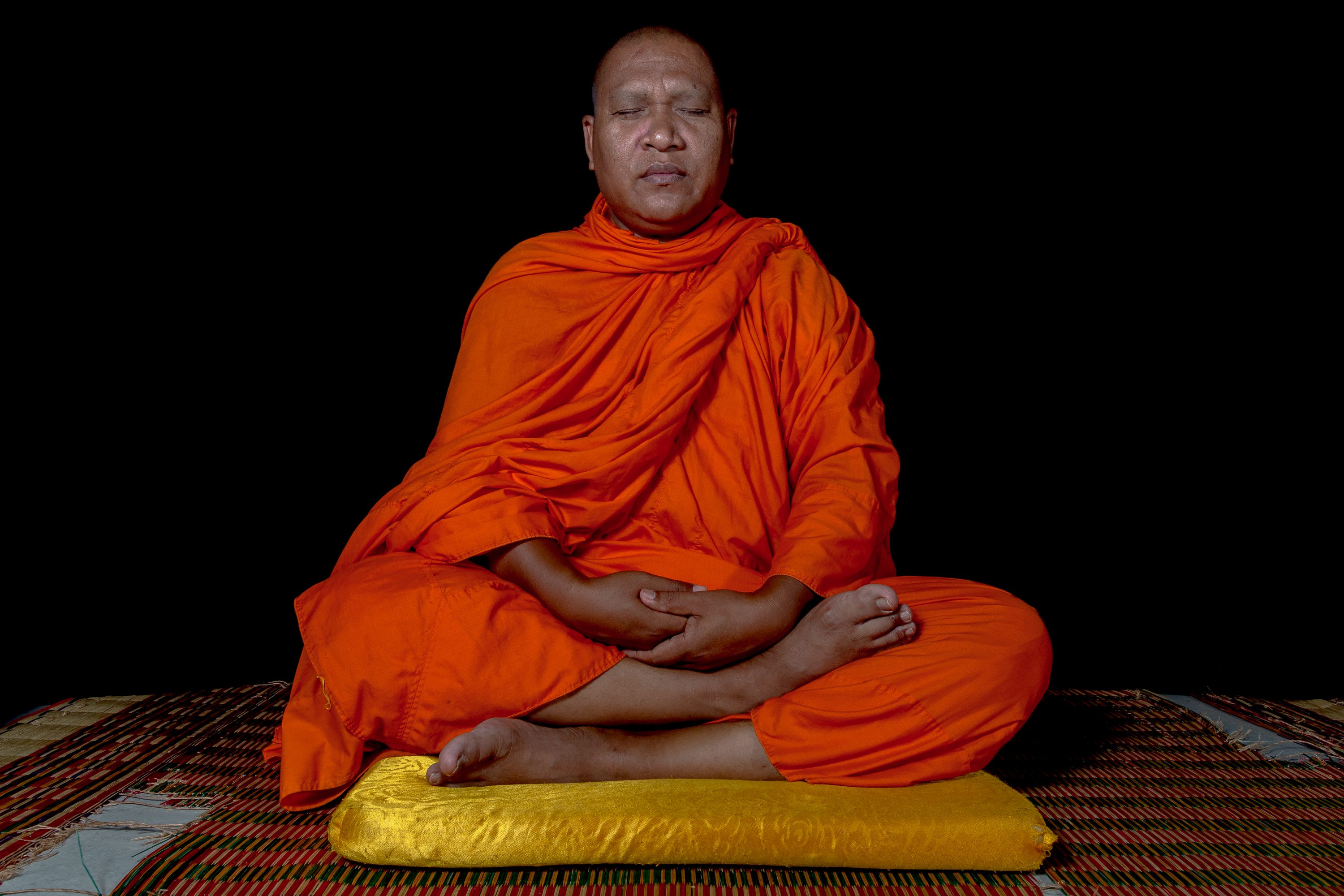 Luon Sovath meditates inside Samaki Raingsey Pagoda in Cambodia