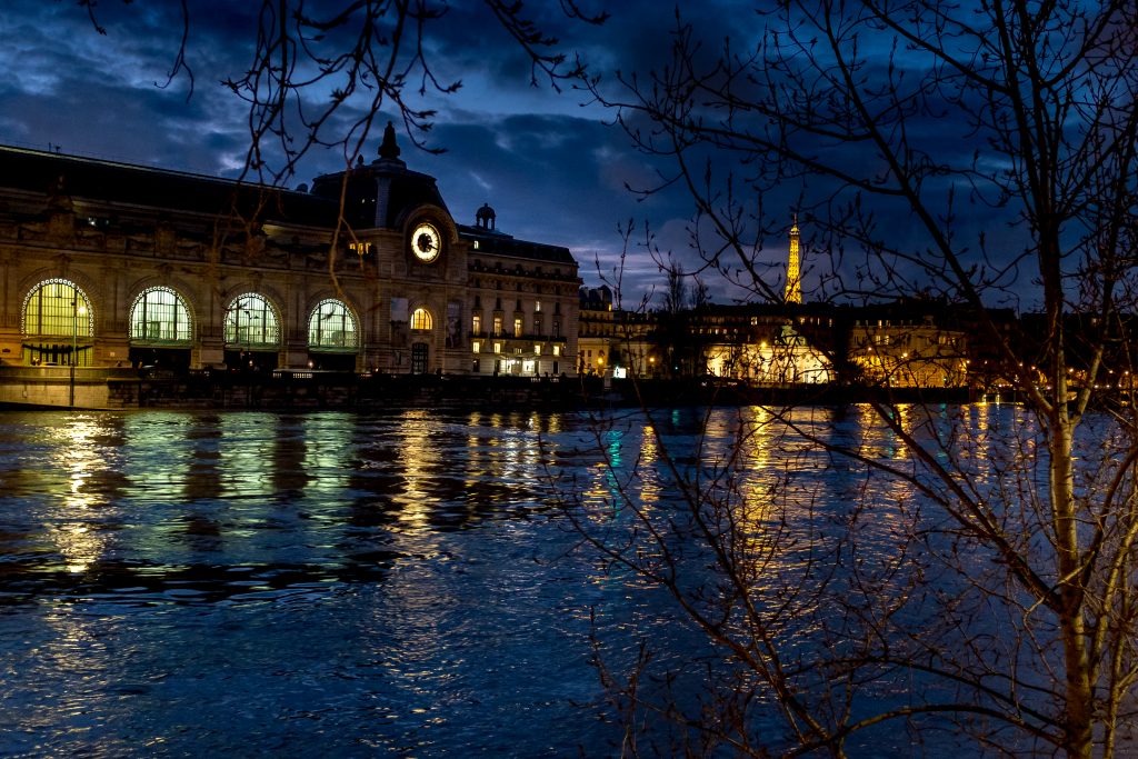 The famous Eiffel Tower is seen illuminated at night in Paris
