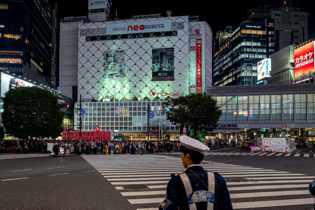 People are ready to cross the Shibuya pedestrian in Tokyo