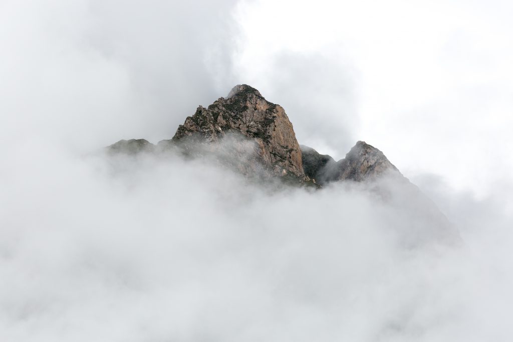 A peak emerges from the clouds in Nepal