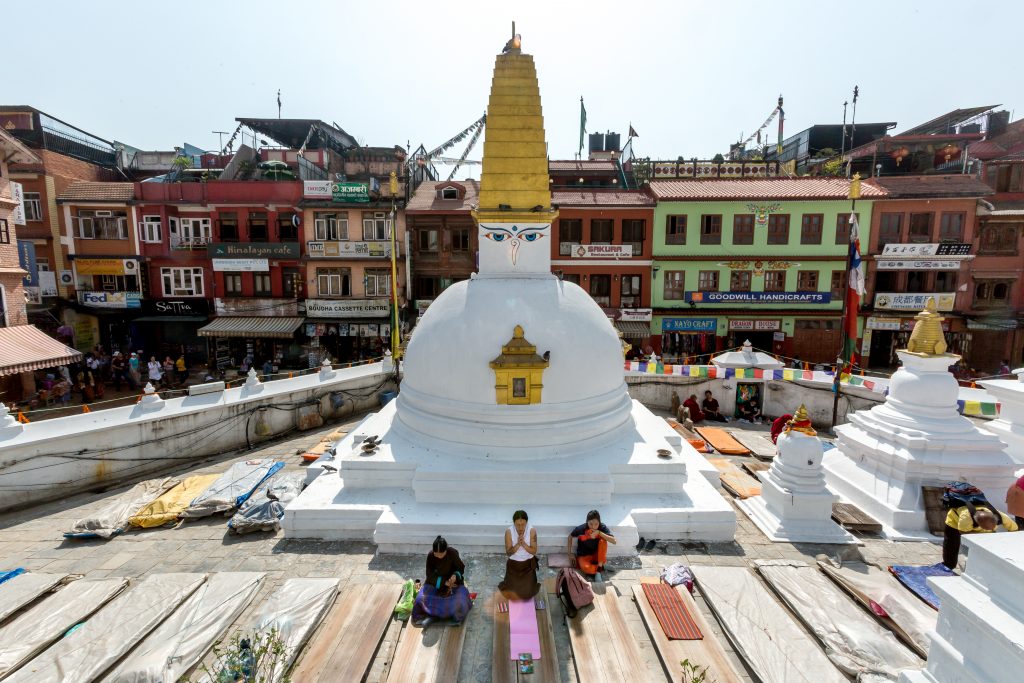 Buddhist devotees pray early in Nepal