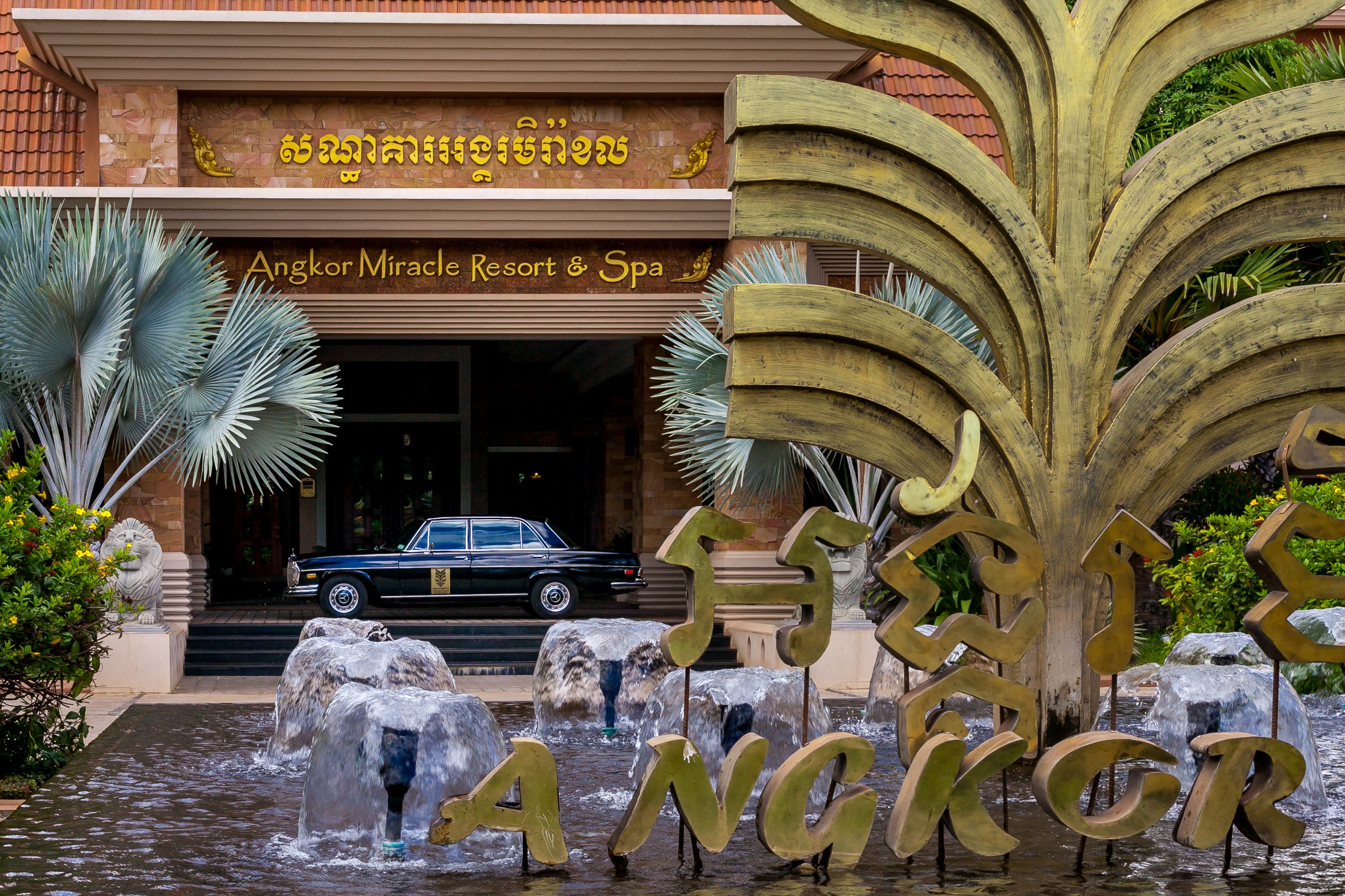 A Mercedes limousine is parked in Cambodia