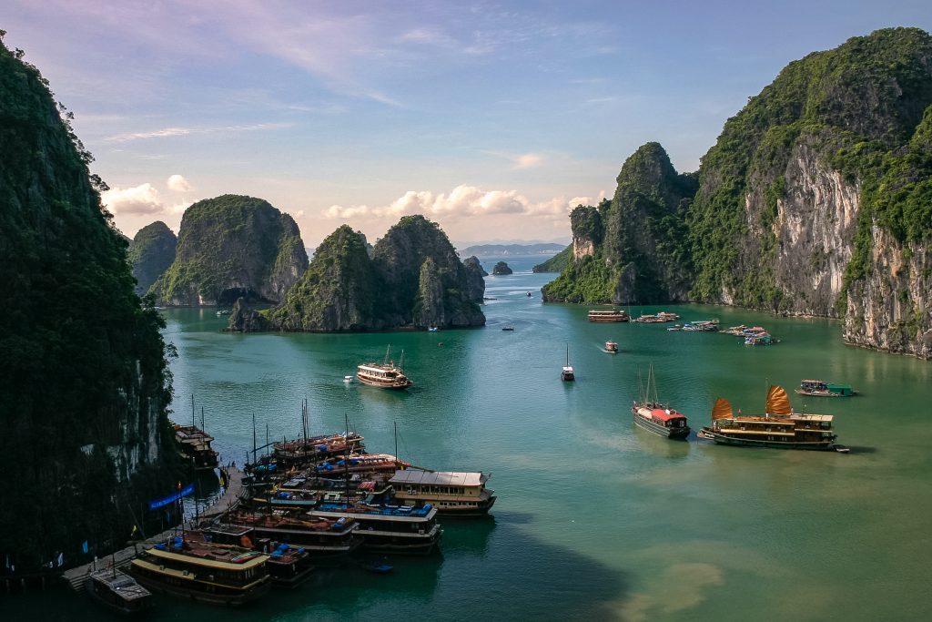 Traditional dragon boats are seen anchored in Halong Bay in Vietnam