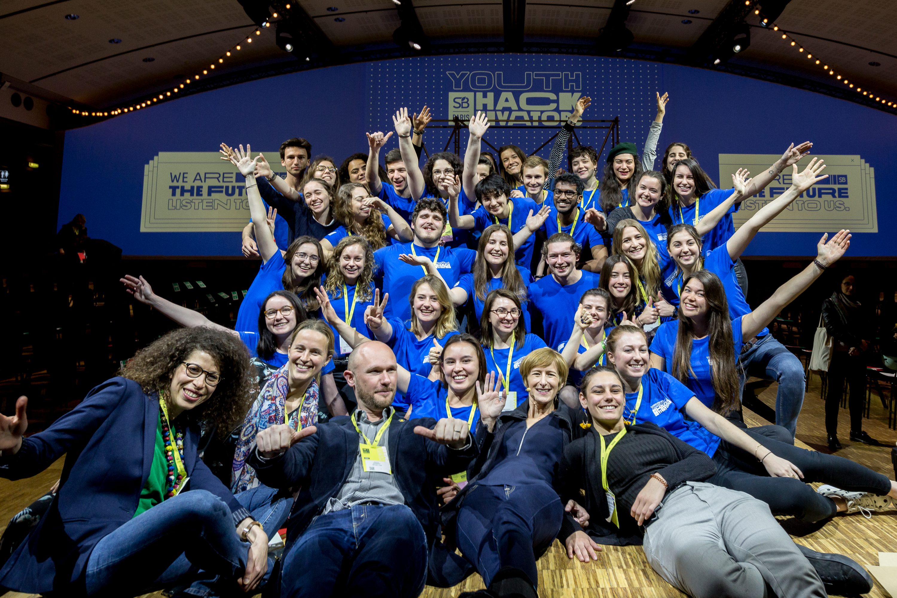 Organisers and attendees of the Sustainable Brands Paris conference pose for a photo