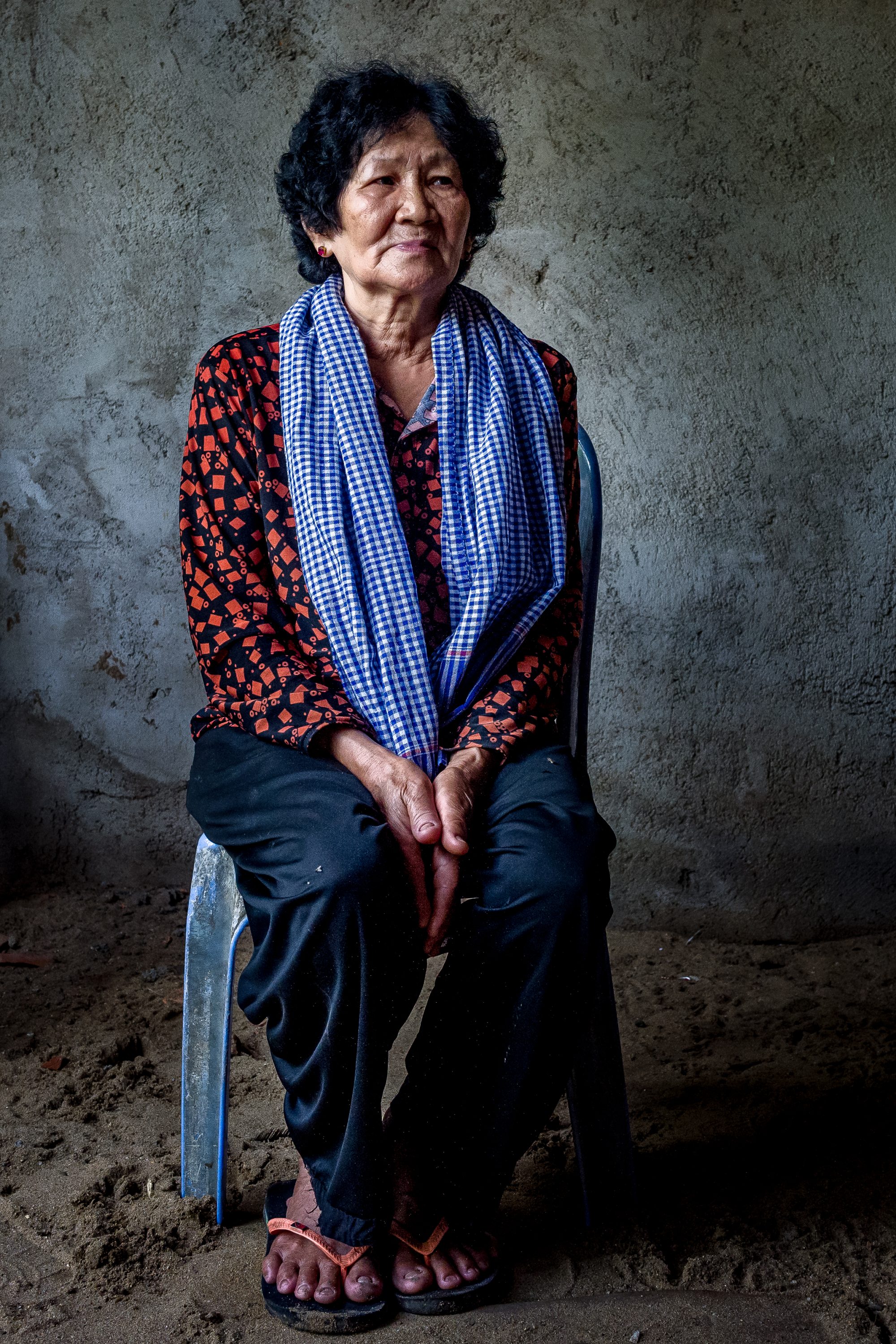The mother of Boeung Kak Lake activist Tep Vanny poses for a photo in Cambodia